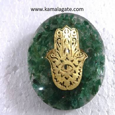 green Aventurine orgone dome with hamsa symbol